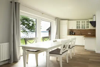 Image de Apartment 16 in the Schleiblick apartment house with direct view of the Schleiblick on the ground floor
