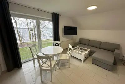 Image de Apartment 20 in the apartment house Schleiblick with direct Schleiblick view 1st floor