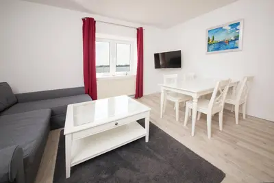 Image de Apartment 3 in the Schleiblick apartment house with a direct view of the Schlei on the ground floor