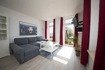 Image de Apartment 8 in the Schleiblick apartment house with a direct view of the Schlei on the ground floor