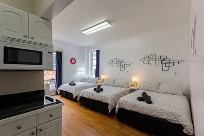 Image de Cozy Studio 3 Full beds in Midtown 1
