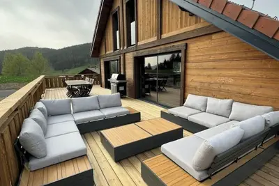 Image de Chalet L'Arbre de vie - Salle de cinéma
