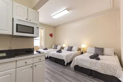 Image de Cozy Studio 3 Full beds in Midtown