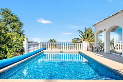 Image de Maison de vacances 'Melodie Delfin' avec vue sur la montagne, Wi-Fi et climatisation