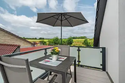 Image de Appartement 'Auszeit' avec balcon et Wi-Fi