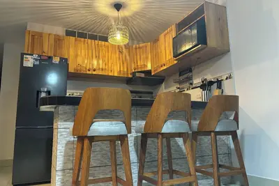 Image de Comfortable House (1st floor)3 bedrooms(all Tv), 3 bathrooms(hot water), 5 beds