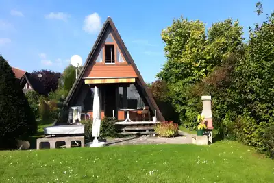Image de Maison de vacances 'Nurdach-Haus (Type 7)' avec terrasse privée, jardin privé et Wi-Fi