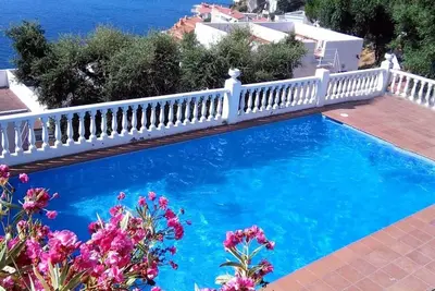 Image de Casa Bramer Casa dúplex con espectaculares vistas a la bahía de Canyelles.