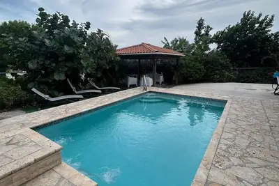 Best Getaway 2-bedroom house in enchanting Lajas with Private Pool, sleeps 8