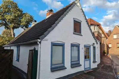 Image de Maison de vacances 'Möwennest Meldorf' avec terrasse privée, jardin privé et Wi-Fi