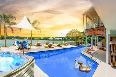 Waterfront w/ Beach Htd Pool Cinema Game Room Tiki