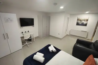 Image de Leeds 3 Bed En-suites Apartment Retreat- Sleeps 9