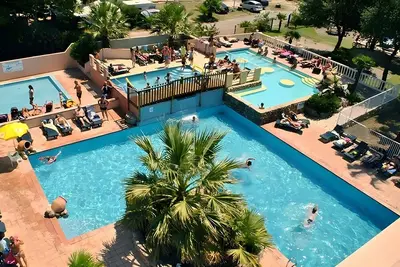 Image de Mobile Home 'Chez Sylvie' avec piscine partagée, Wi-Fi et climatisation