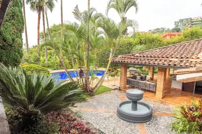 Image de Premium Mansion in El Poblado w/Nightclub & Maid/Cook, Pool, Sauna, 7 Bedrooms