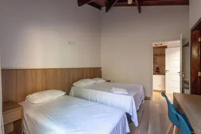 Image de Quarto com Wi-Fi, ar-condicionado e a 300m do mar
