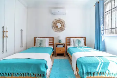 Charming 2-bedroom Condo Near White Sandy Beaches and Surf Breaks