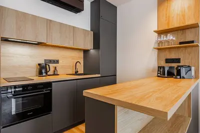 Image de Joli appartement pour 3 personnes avec Wifi, climatisation, Tv et parking