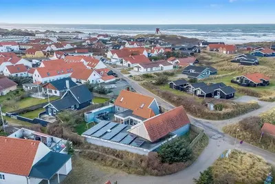 Image de Large holiday home with pool and spa in the middle of Blokhus town, close to the North Sea.