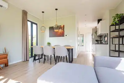 Image de The six-person holiday villa Amalia with private sauna has a spacious living room, open kitchen, three bedrooms and a spacious patio.