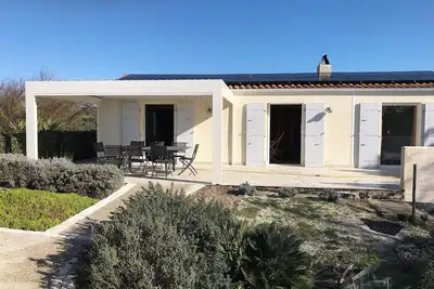 Image de maison plein pied vue sur l’ océan  80 m de la plage