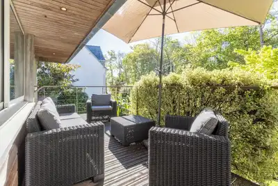 Image de Maison de vacances 'Maison De Kerobistin - Plage À 150m' avec vue sur la mer, Wi-Fi et climatisation