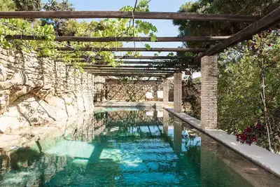 My Rental Homes - Villa Oasis with infinity pool surrounded by the garden