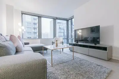 Image de Gorgeous Midtown 2 Bed w/ W/D, Gym, Rooftop #6117