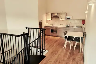 Image de Quiet Train Station Apartment With Balcony | Gym | Secure Free Sheltered Parking