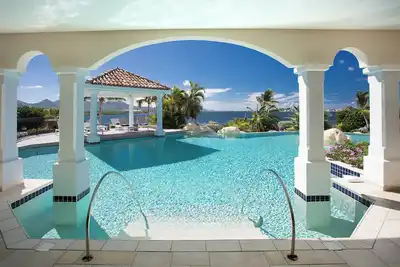 Image de La Salamandre in Terres Basses by Personal Villas - Free-Form Swimming Pool