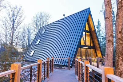 Image de 6-bdrm 5. 5 bath aframe cabin-private trails, hot tub, sauna, woods Boyne City, Mi