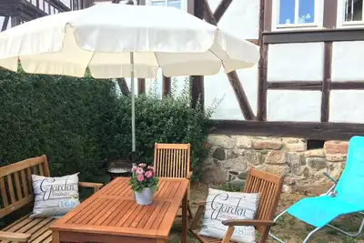 Image de Maison de vacances 'An Der Truse' avec terrasse partagée, jardin privé et Wi-Fi