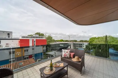Image de Appartement moderne avec terrasse Ă Lignano Sabbiadoro
