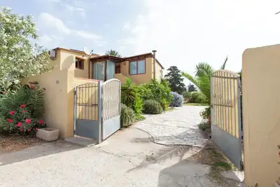 Five bedrooms & 4 bathrooms. A few steps from a white sandy beach, South Sardinia