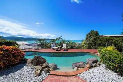 Image de 4-bedroom home with a pool and sweeping views of the Coral Sea Marina
