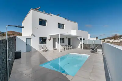 Image de Maison de vacances 'Tranquilidad Entre Volcanes' avec piscine privée, terrasse partagée et Wi-Fi