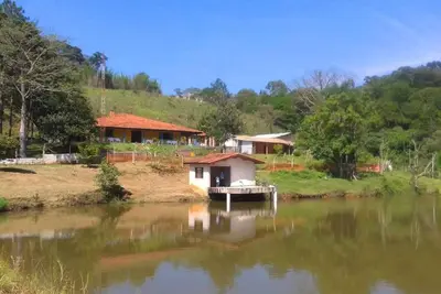 Image de Recanto das Corujas site, with a farmhouse style mansion