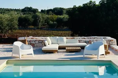 Image de Il Trullo Dell' Aia charming trullo with swimming pool among olive trees and orchard