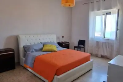 Image de Cozy apartment, 5 minutes from the historic center with sea and Etna views.