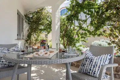 Image de Casa Stella Marina: intimate home with furnished patio and small garden