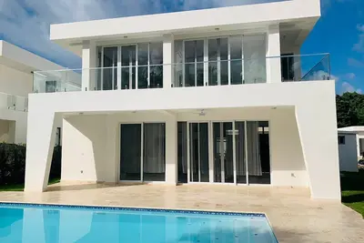 Image de Brand new 3 bedroom 3. 5 bath villa in Sosua. Minutes from the beach