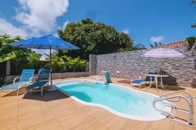 Image de Casa aconchegante com Wi-Fi e piscina prox a praia