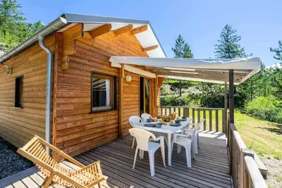 Image de Holzhütte Komfort 35m2 3 Schlafzimmer + Tv + Terrasse 8 Personen