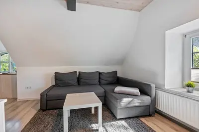 Image de Appartement 'Friesenstube' avec terrasse partagée, jardin partagé et Wi-Fi