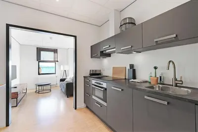 Image de Cozy apartment (39 m²) on the land side on the 1st floor with a lovely living room and open kitchen.