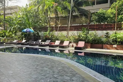 Image de Spacious 4-bedroom apartment in wonderful ตำบลป่าตอง with fitness room, WiFi