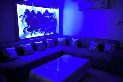 Image de stylish vacation home with home theater, games zone and open terrace