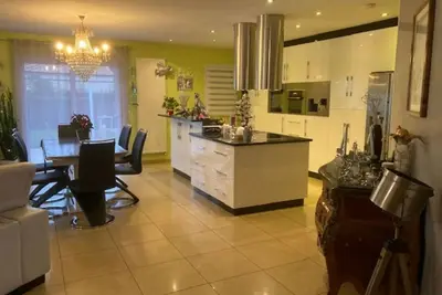 Image de A 1600m de la plage! Belle maison avec Spa et Billard idéales pour les familles