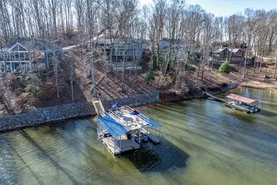Amazing Lakeviews! Beautifully decorated 4 bdm waterfront home with 2-story dock