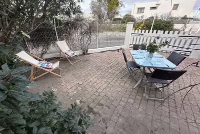 Image de Charmant 2 Pièces avec terrasse et jardin clos, parking inclus