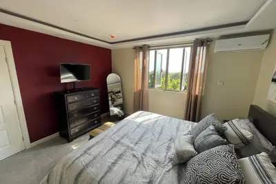 Image de Modern Chic Apartment Suite With Pool & Ocean View with Ac, WiFi in Kingston